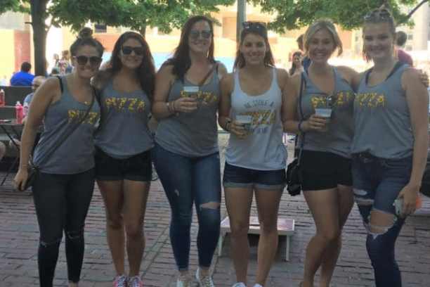 a group of people posing for the camera