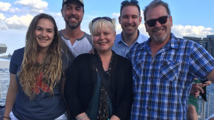 a group of people posing for a photo