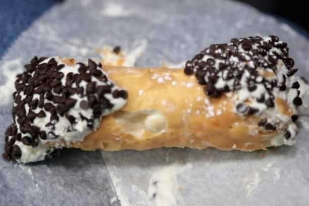 a piece of cake covered in chocolate