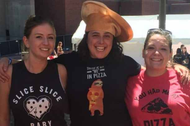 a group of people posing for the camera