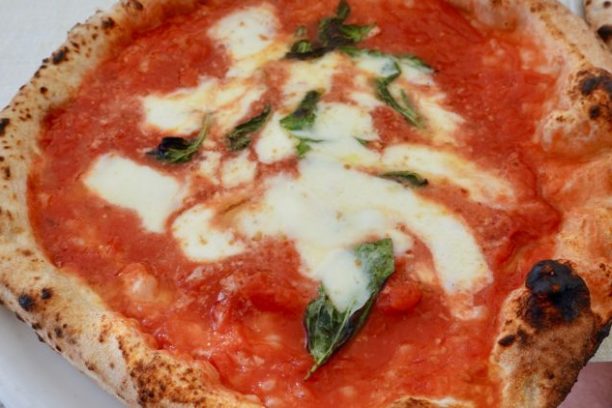 a close up of a slice of pizza