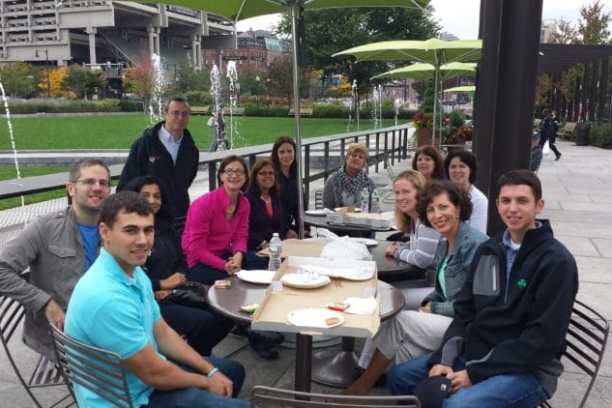 a group of people sitting at a table